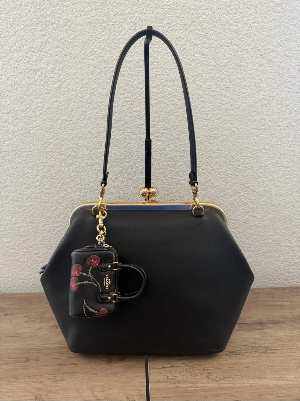 Coach bag charm
